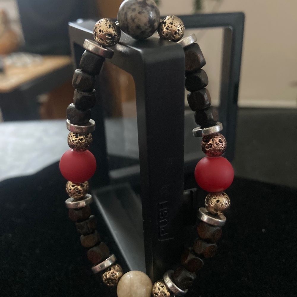 Elegant Beaded Bracelet with Red and Gold Accents